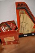 A childs zither and 502 concertina