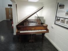 A late19th Century mahogany cased baby grand piano by Cramer & Sons
