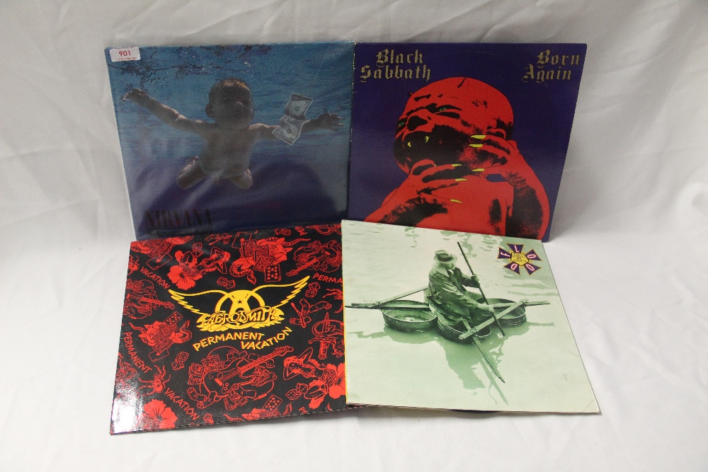 A four album lot with Sabbath and a classic title from Nirvana