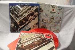 A Beatles interest lot with coloured vinyl edition in this lot