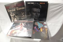 A David Bowie four album lot - classic stuff on offer here