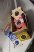 A large box ( 100 ) of singles with the bulk being 1960's and in company bags - some rare titles and