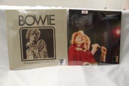 A lot of two David Bowie Record Store Day limited records in NM/NM