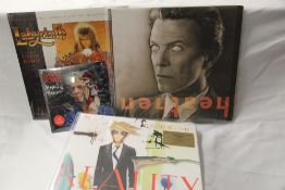 A lot of three David Bowie album and a sealed coloured vinyl 45