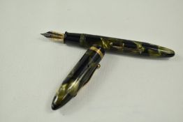 A Sheaffer Balance Lifetime lever fill fountain pen in green/black marble with single band and white