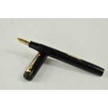 A Conway Stewart 55 lever fill fountain pen in black with single broad band and two narrow bands