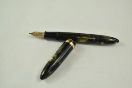 A Sheaffer Balance Lifetime Junior lever fill fountain pen in green/black marble with single band