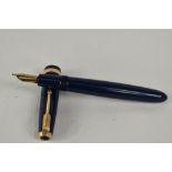 A Parker Duofold aeromatic fill fountain pen in blue, having decorative broad band to the cap having
