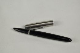 A Parker 51 aeromatic fill fountain pen in black with lustiloy cap. Approx 13.8cm in very good