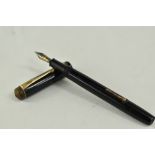 A Conway Stewart 388 lever fill fountain pen in black with one broad and two narrow bands to the cap