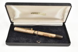 A boxed Waterman Ideal lever fill fountain pen with a 9ct engine turned gold cap and barrel cover