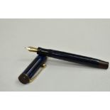 A Parker Duofold Lucky Curve Lady button fill fountain pen blue black with three bands to the cap