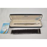 A boxed Cross sterling silver ballpoint pen. Good condition