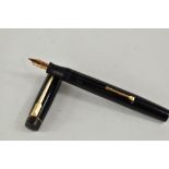 A Croxley lever fill fountain pen in black with single narrow band to cap having Dickenson nib.