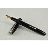 A Conway Stewart 75 lever fill fountain pen in black with single band to the cap having Conway