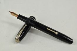 A Conway Stewart 75 lever fill fountain pen in black with single band to the cap having Conway
