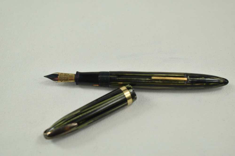 A Sheaffer Balance 875 lever fill fountain pen in green striated with single band to cap, military