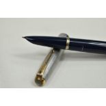 A Parker 51 vacu fill fountain pen in dark blue with sterling silver cap. Approx 13.6cm in very good