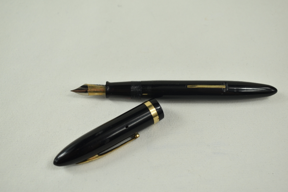 A Sheaffer Balance Lifetime Slim lever fill fountain pen in black with single band and white spot to