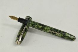 A Conway Stewart 75 lever fill fountain pen in green marble with single band to the cap having