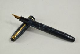 A Conway Stewart 15 lever fill fountain pen in blue black marble with single band to the cap
