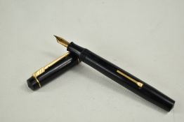 A Croxley lever fill fountain pen in black with single narrow band to cap having Dickenson nib.