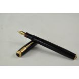 A Parker Vacumatic pump fill fountain pen in black with two narrow bands to the cap having Parker