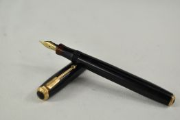 A Parker Vacumatic pump fill fountain pen in black with two narrow bands to the cap having Parker