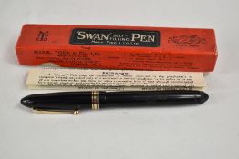 A boxed Mabie Todd & Co Swan leverless 4261 twist fill fountain pen in black with one broad and