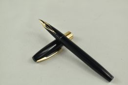 A Sheaffer Imperial cartridge/converter fountain pen in black having broad band to cap and white