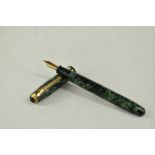 A Conway Stewart 27 lever fill fountain pen in green black hatch with single broad band to the cap