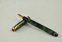 A Conway Stewart 27 lever fill fountain pen in green black hatch with single broad band to the cap