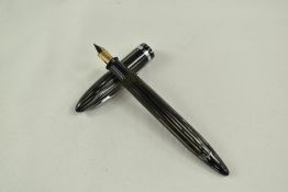 A Sheaffer Balance Lifetime vacu fill fountain pen in black/grey striated with single band and no