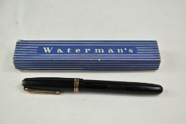 A boxed Waterman 513 lever fill fountain pen in black with three bands to the cap having Waterman
