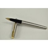 A Parker 65 Flighter Deluxe aeromatic fountain pen in brushed steel with Parker 14k nib. Approx 13.