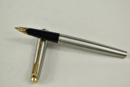 A Parker 65 Flighter Deluxe aeromatic fountain pen in brushed steel with Parker 14k nib. Approx 13.