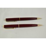 Two Parker No3 propelling pencils in red. Good condition