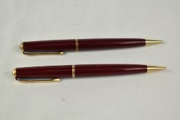 Two Parker No3 propelling pencils in red. Good condition