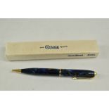 A boxed Conway Stewart 25 propelling pencil in blue marble with gold veining, very good condition