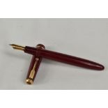 A Parker Duofold Senior aeromatic fill fountain pen in red, having decorative band to the cap having