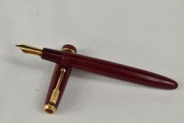 A Parker Duofold Senior aeromatic fill fountain pen in red, having decorative band to the cap having