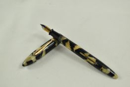 A Sheaffer Balance lever fill fountain pen in black/pearl with single band and no spot to the cap