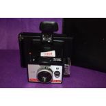 A Polaroid Colorpack 80 land camera