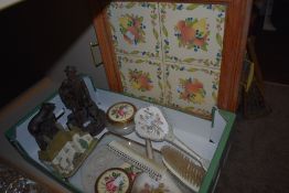 Two Heredities, one being a farmer and dog the other a field mouse, dressing table set and a tea