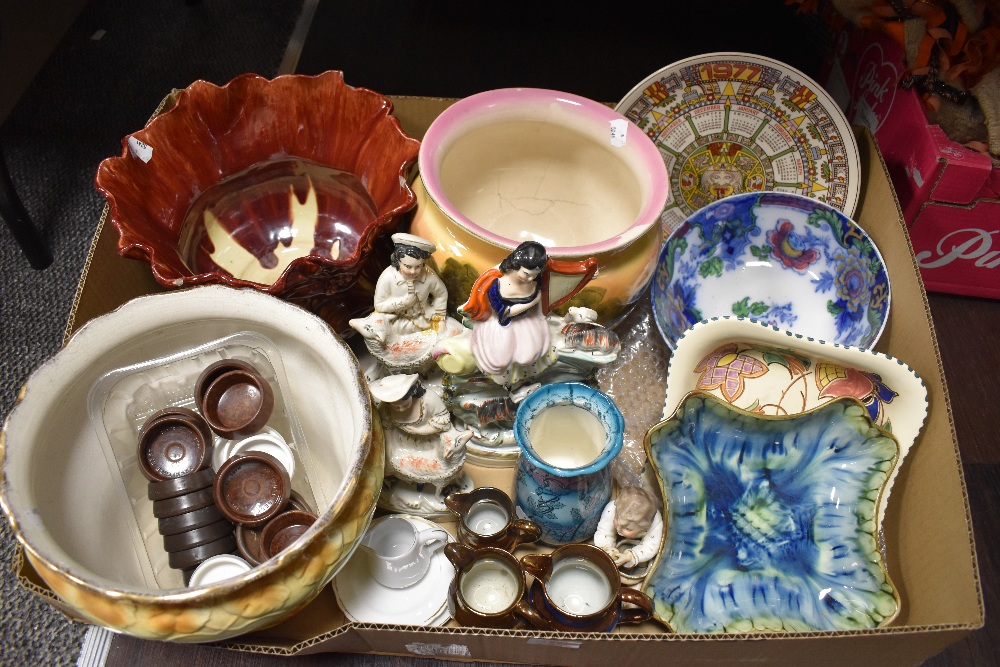 A Bretby jardinière in red and cream AF along with a Paragon jardinière in beige with floral design,