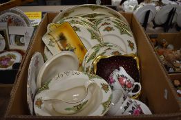 A box containing a Royal Staffordshire Pottery part dinner service with green and floral pattern a