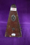 An early 20th century System Maezel Metronome in wooden case.