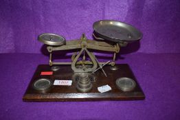 A set of vintage Ensign postal scales with accompanying weight set