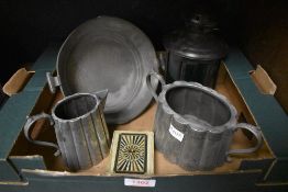 A Period Pewter two handled dish along with a pewter sugar bowl and milk jug and a tea light holder