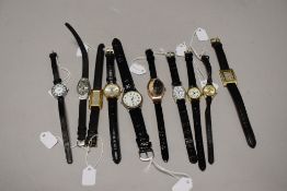 Ten ladies/girls fashion watches, all with black straps.